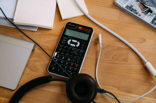 Bookkeeping Clean Up services - calculator, office devices on desk